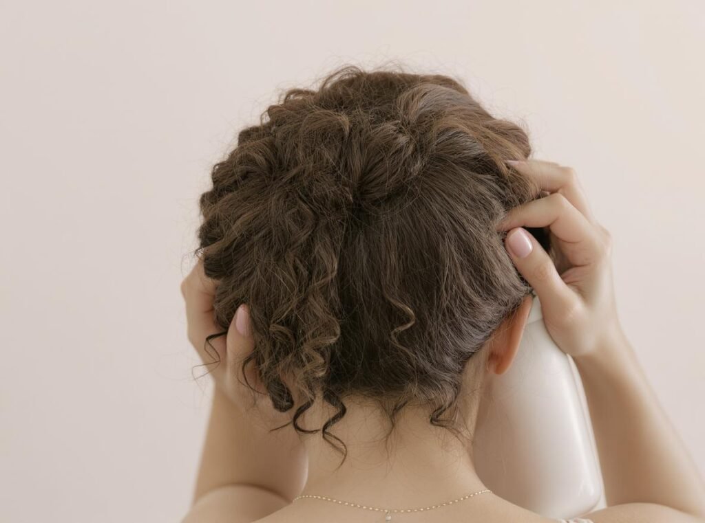 Essential hair care products for blow-drying curly hair safely