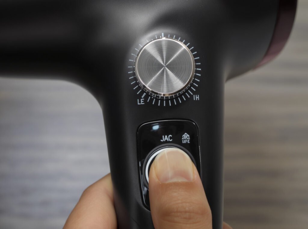 Hair dryer control panel showing multiple speed settings for customized extension styling